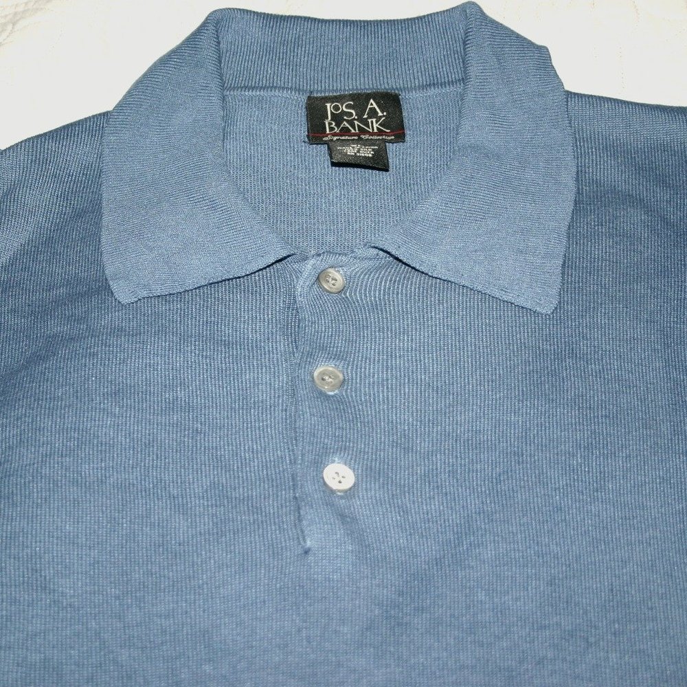 This is a Jos A Bank Blue 100% Silk Polo. It is an XL and feels amazing on.